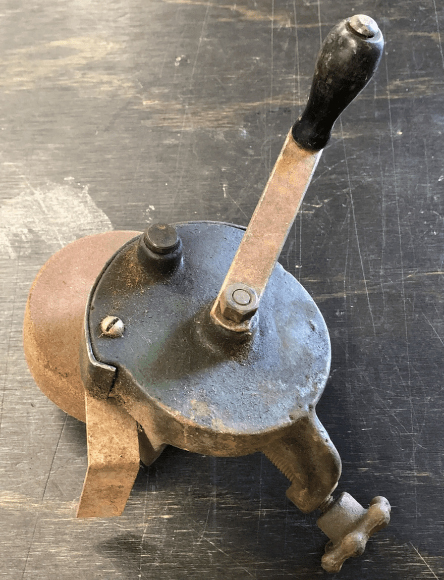 An old-fashioned hand tool that was easy to operate and widely used in the past