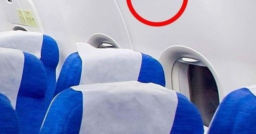 Here’s what the the triangle stickers above your airplane seat mean