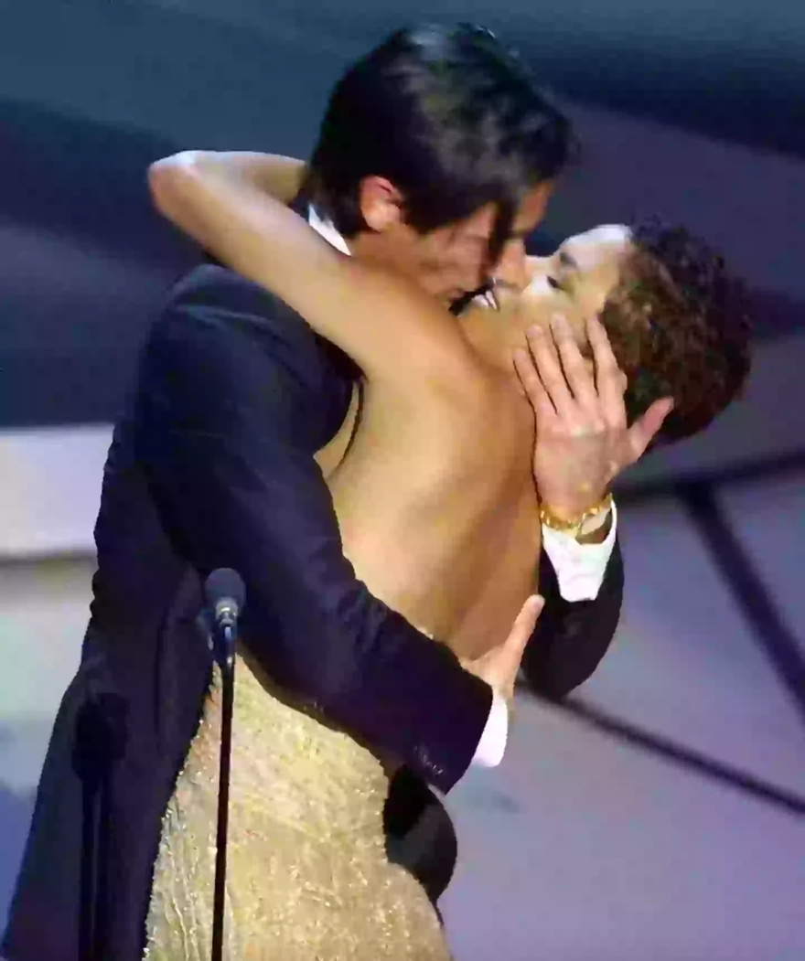 Halle Berry apologises to Adrien Brody’s girlfriend before kissing him on Oscars red carpet