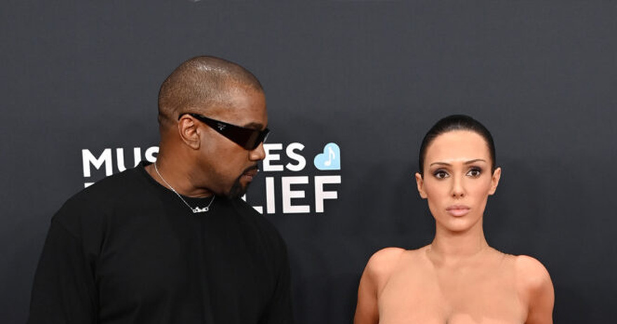 Lip reader decodes what Kanye said to almost-nude wife at Grammys