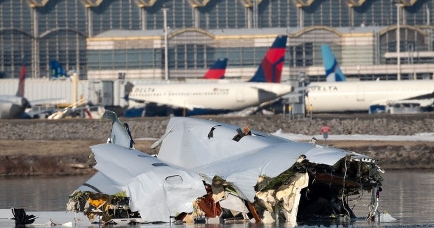 Two airport workers arrested over American Airlines crash leak