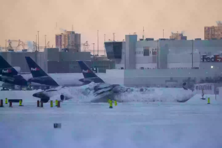 Astonishing new footage shows Delta Air Lines plane crash land before flipping over and exploding into fireball